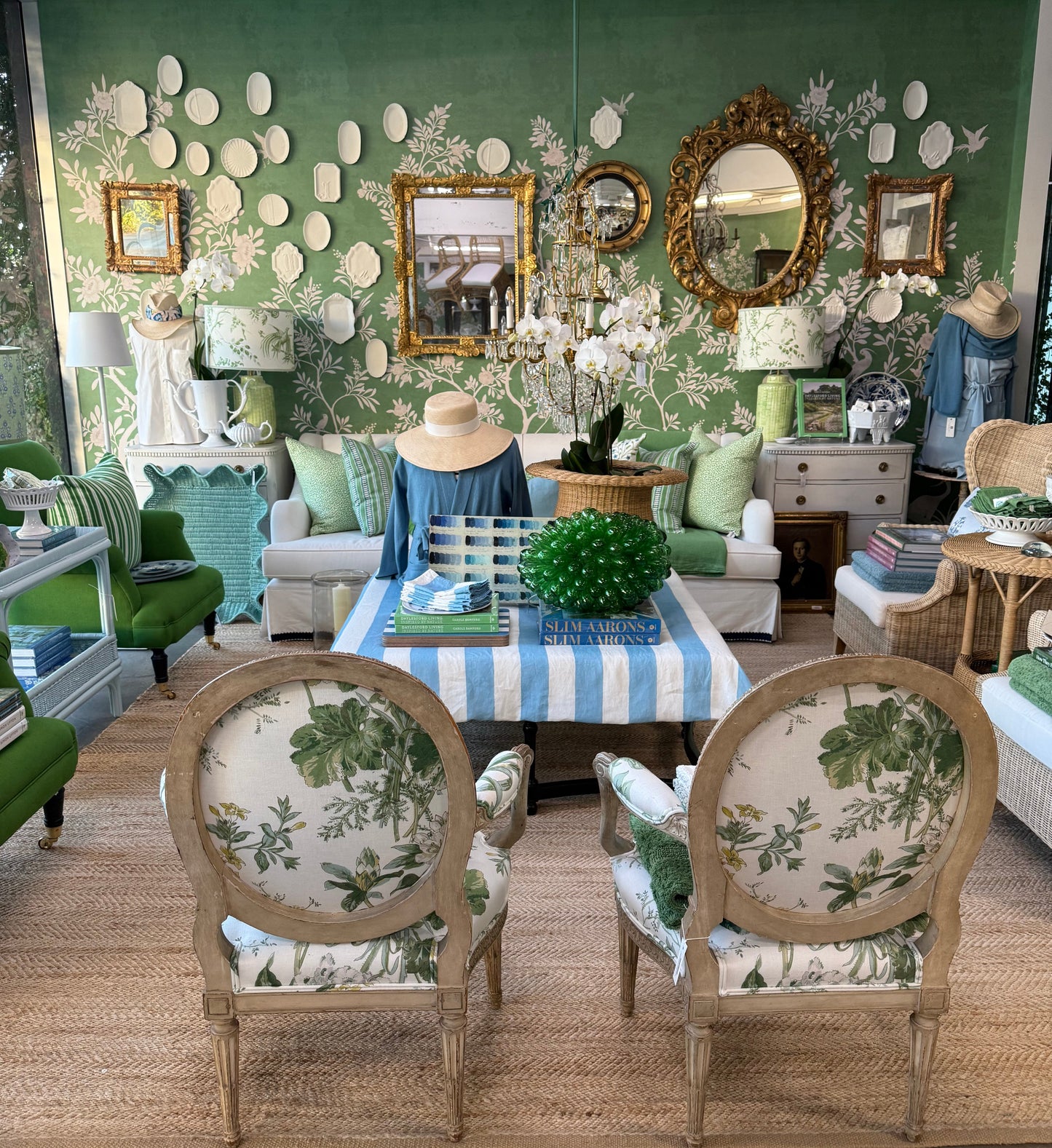 Top-down view of a decorated room with floral-patterned furniture and decor.